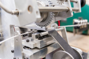 Closeup of a piece of equipment on the Alta manufacturing floor