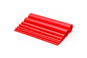 Red heat shrink tubing in various sizes, organized from smallest to largest